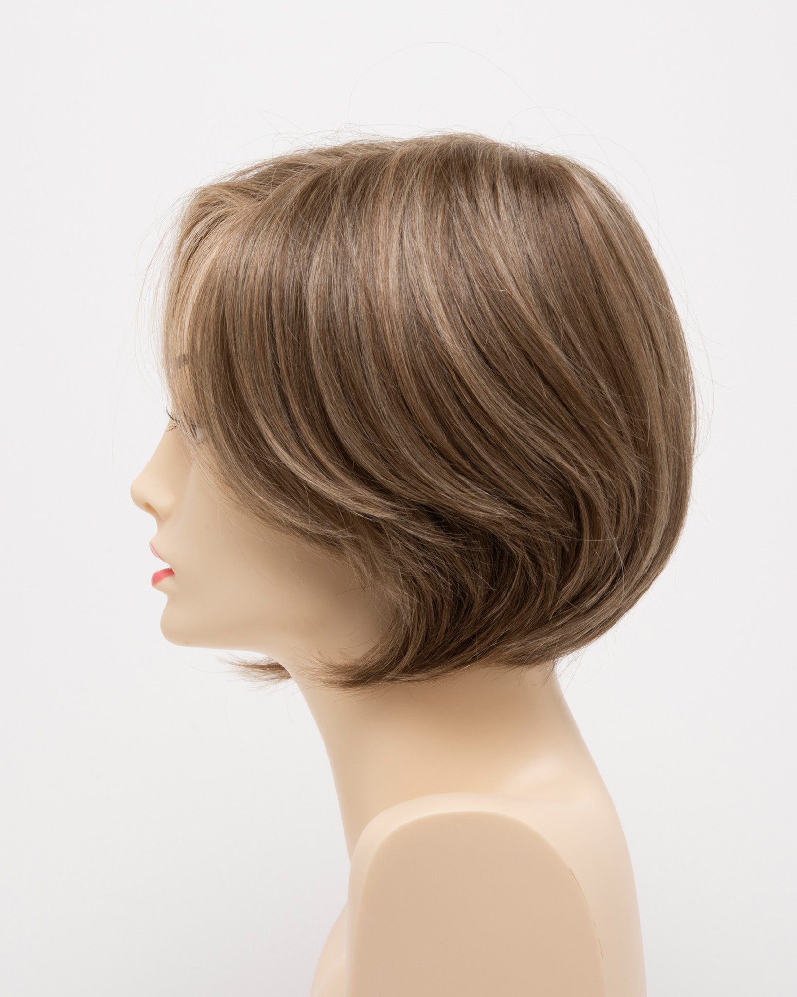 profile side of a short Kinner Beauty Wigs wig for woman on mannequin head