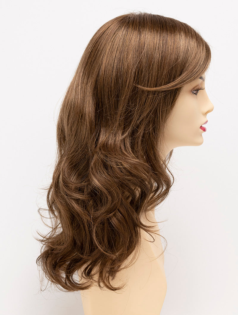 profile side of a long Kinner Beauty Wigs wig for woman on mannequin head
