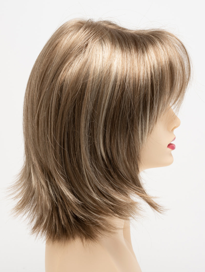 profile side of a medium Kinner Beauty Wigs wig for woman on mannequin head