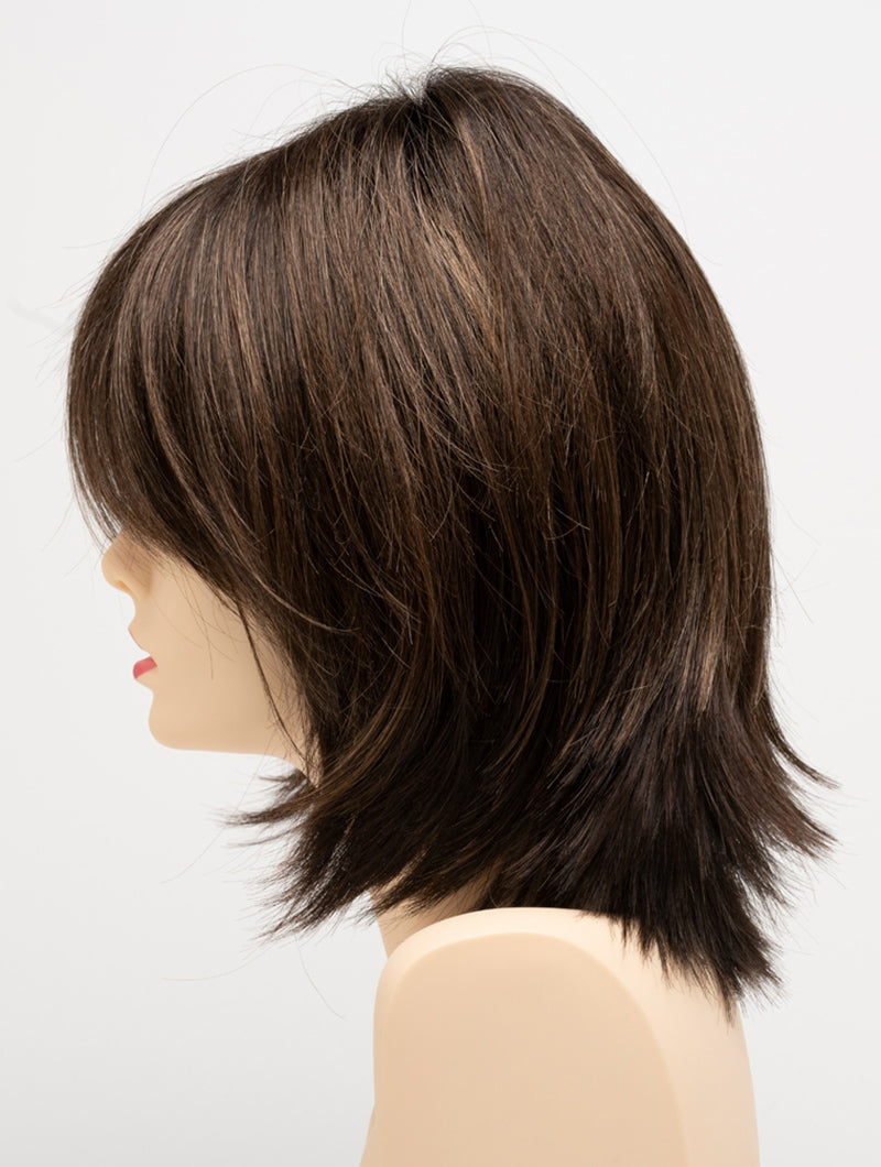 profile side of a medium Kinner Beauty Wigs wig for woman on mannequin head