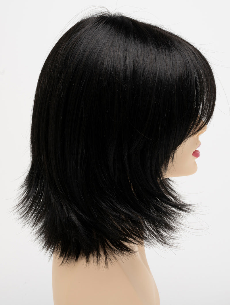 profile side of a medium Kinner Beauty Wigs wig for woman on mannequin head