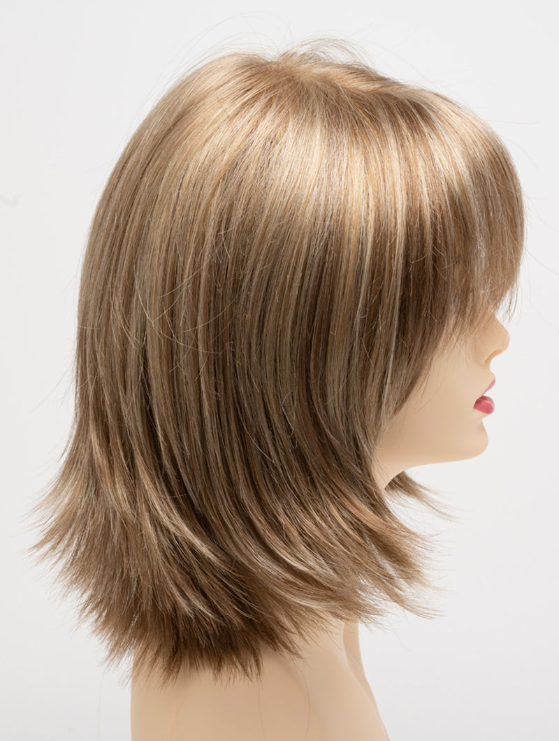 profile side of a medium Kinner Beauty Wigs wig for woman on mannequin head