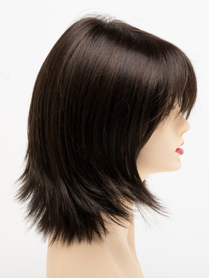 profile side of a medium Kinner Beauty Wigs wig for woman on mannequin head