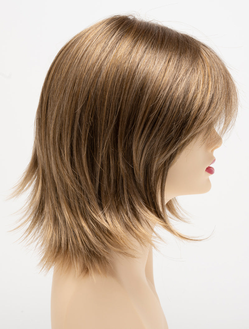 profile side of a medium Kinner Beauty Wigs wig for woman on mannequin head