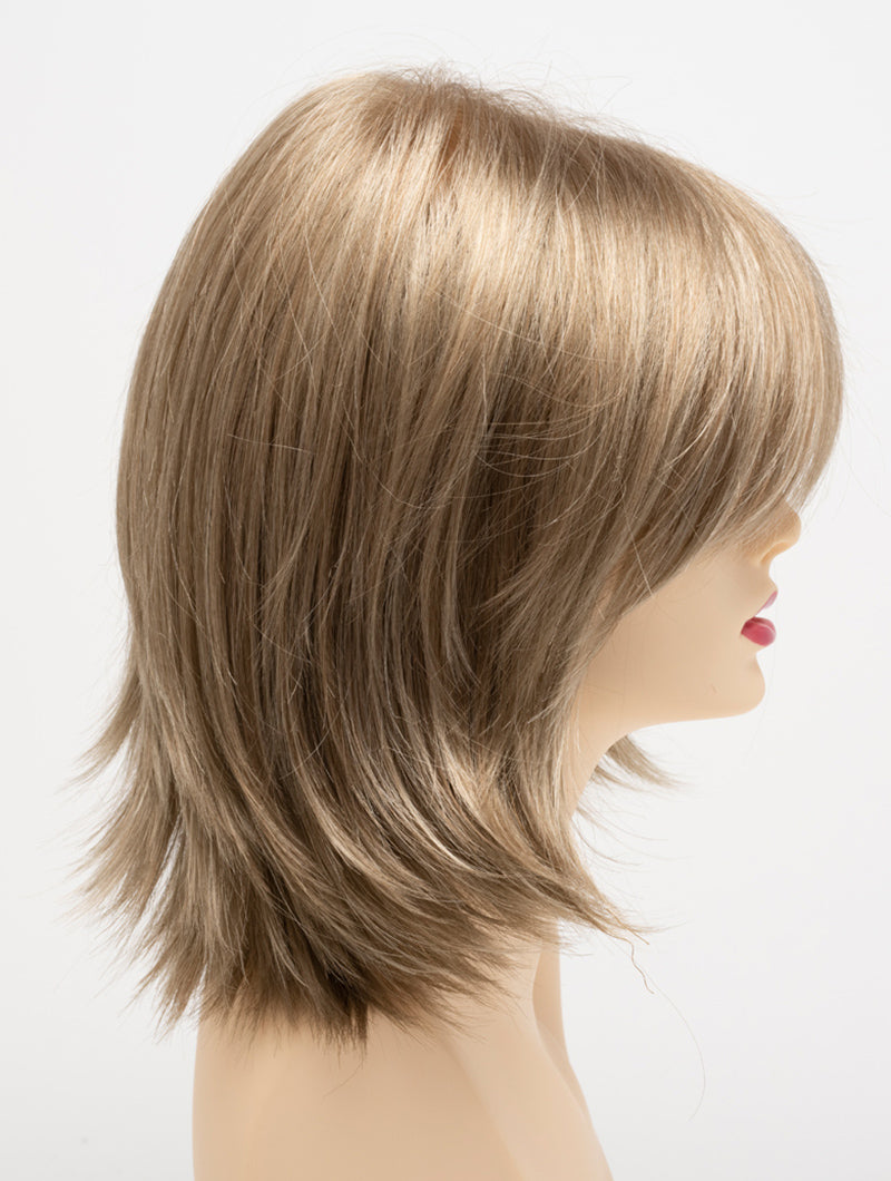 profile side of a medium Kinner Beauty Wigs wig for woman on mannequin head