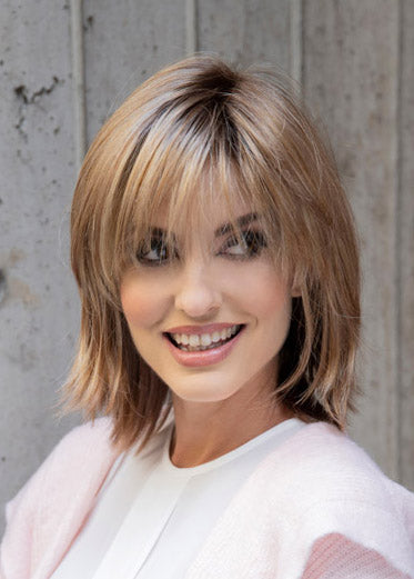 front side of a medium Kinner Beauty Wigs wig on woman head