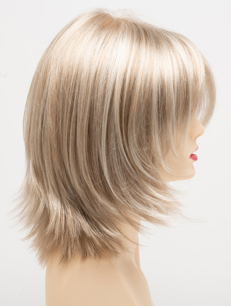 profile side of a medium Kinner Beauty Wigs wig for woman on mannequin head