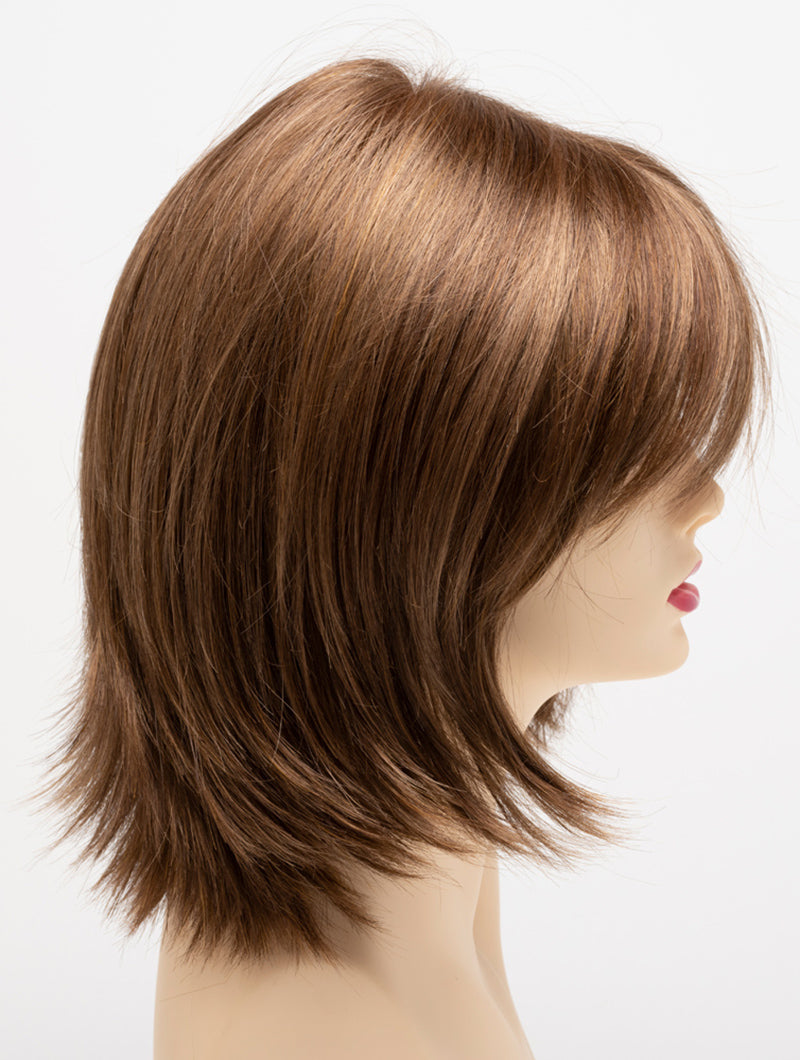profile side of a medium Kinner Beauty Wigs wig for woman on mannequin head