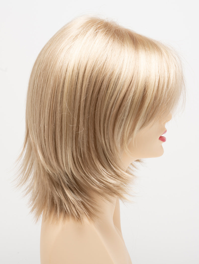 profile side of a medium Kinner Beauty Wigs wig for woman on mannequin head