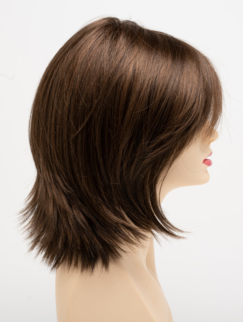 profile side of a medium Kinner Beauty Wigs wig for woman on mannequin head