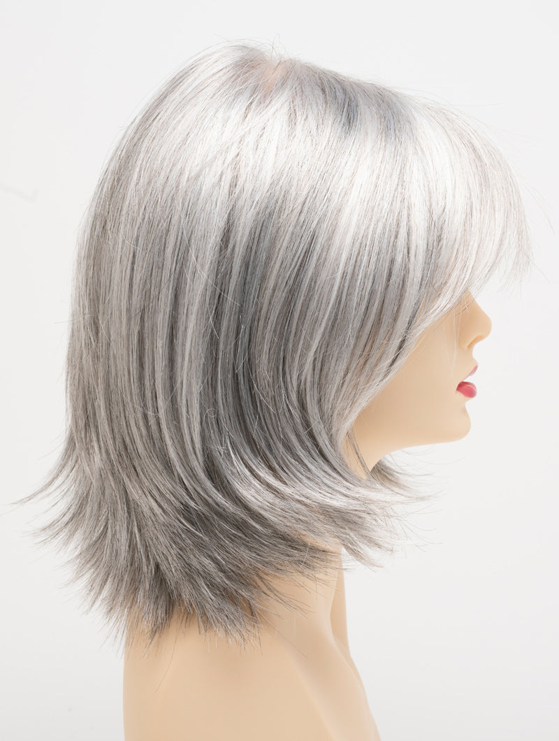 profile side of a medium Kinner Beauty Wigs wig for woman on mannequin head