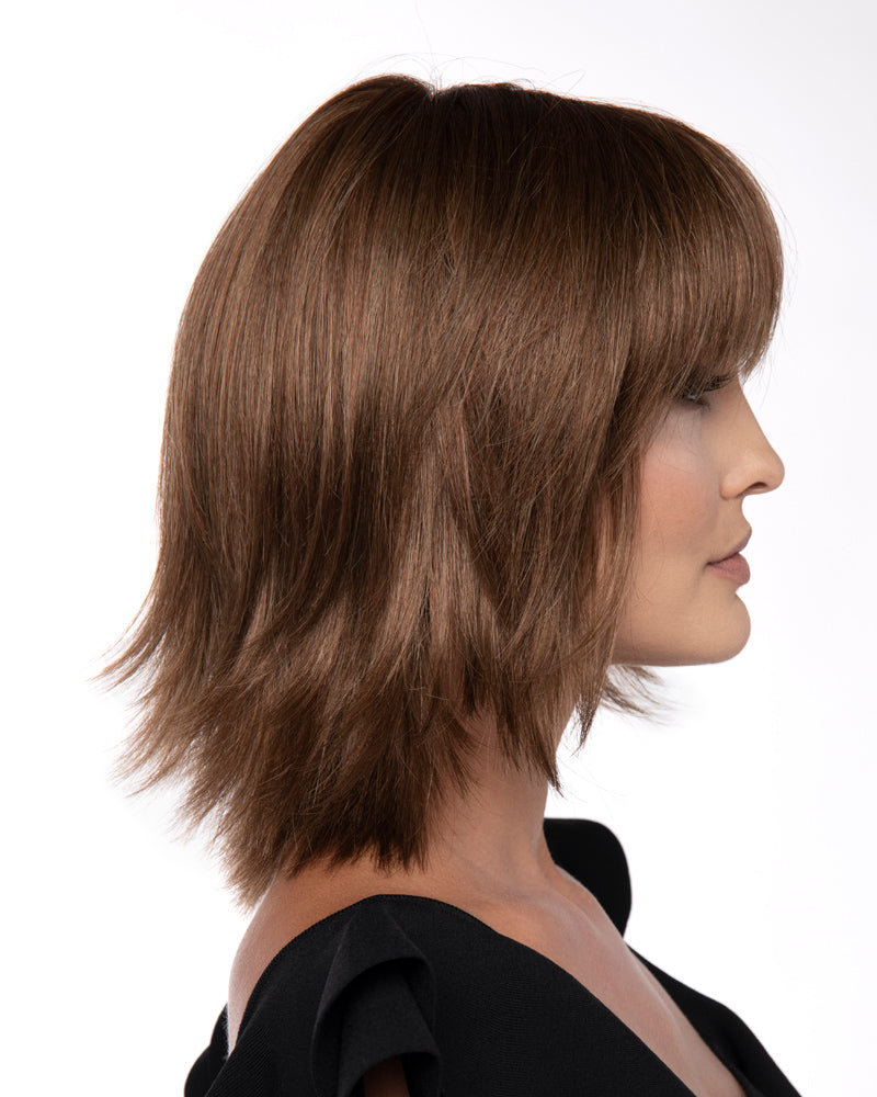 profile side of a medium Kinner Beauty Wigs wig on woman head