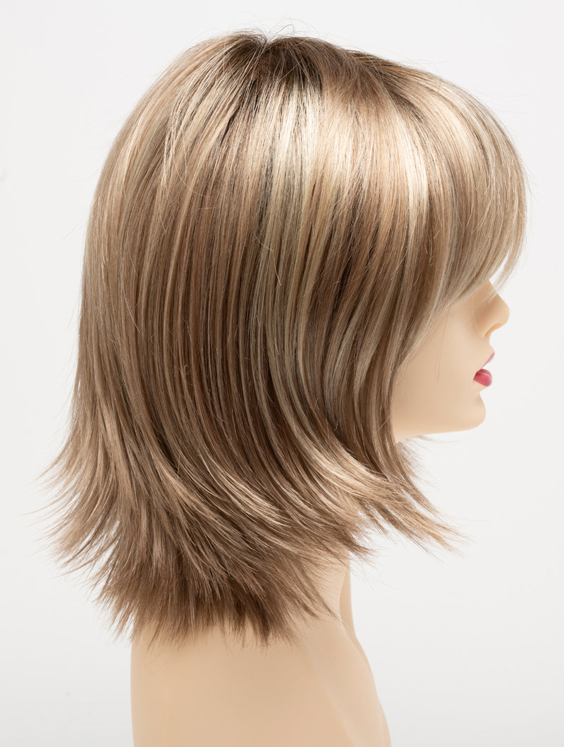 profile side of a medium Kinner Beauty Wigs wig for woman on mannequin head