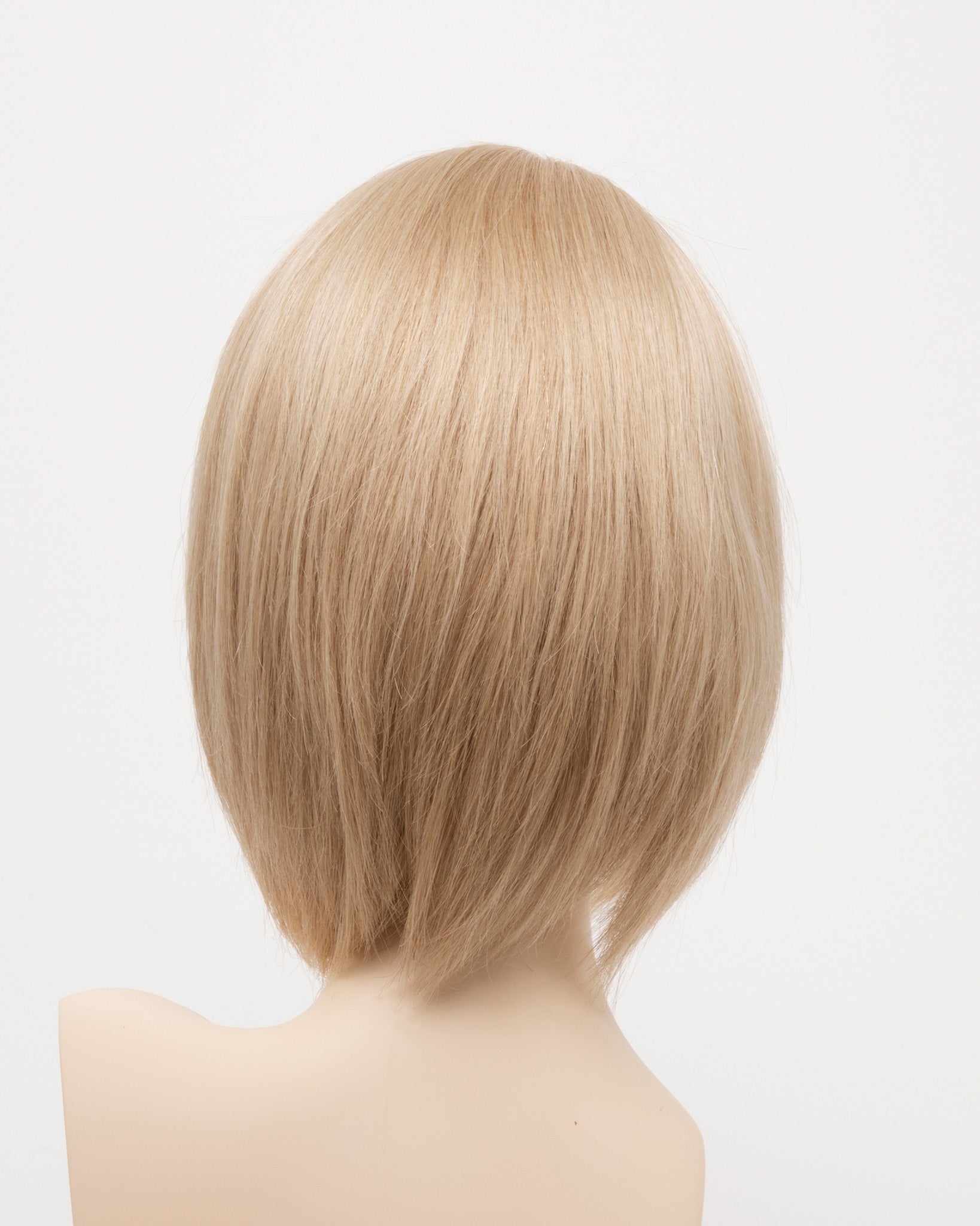 back side of a short wig Kinner Beauty Wigs for woman on mannequin head