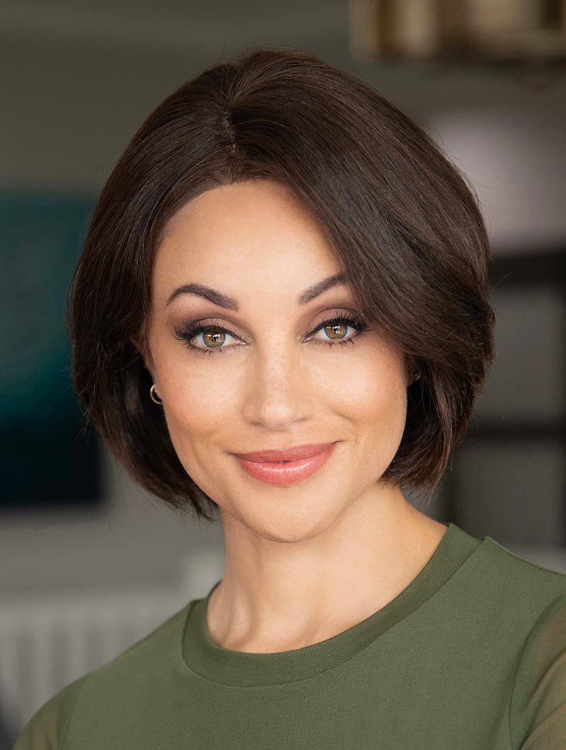 front side of a short Kinner Beauty Wigs wig on woman head