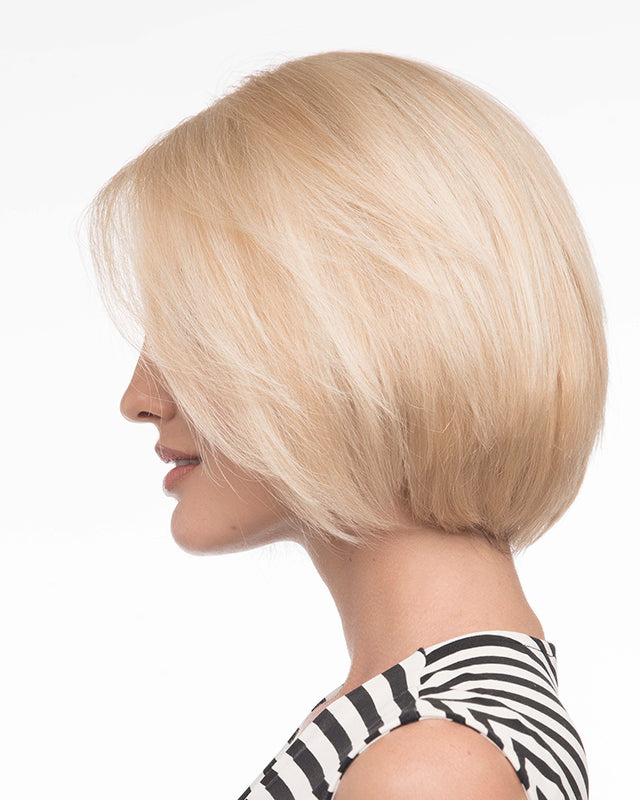 profile side of a short Kinner Beauty Wigs wig on woman head