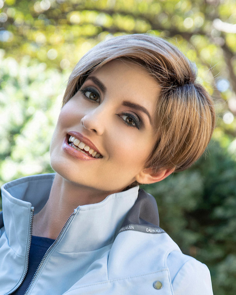 front side of a short Kinner Beauty Wigs wig on woman head