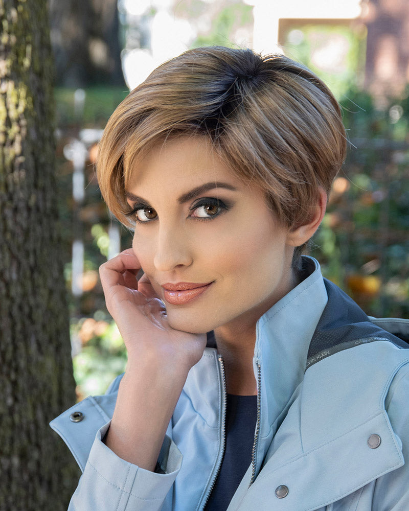 front side of a short Kinner Beauty Wigs wig on woman head