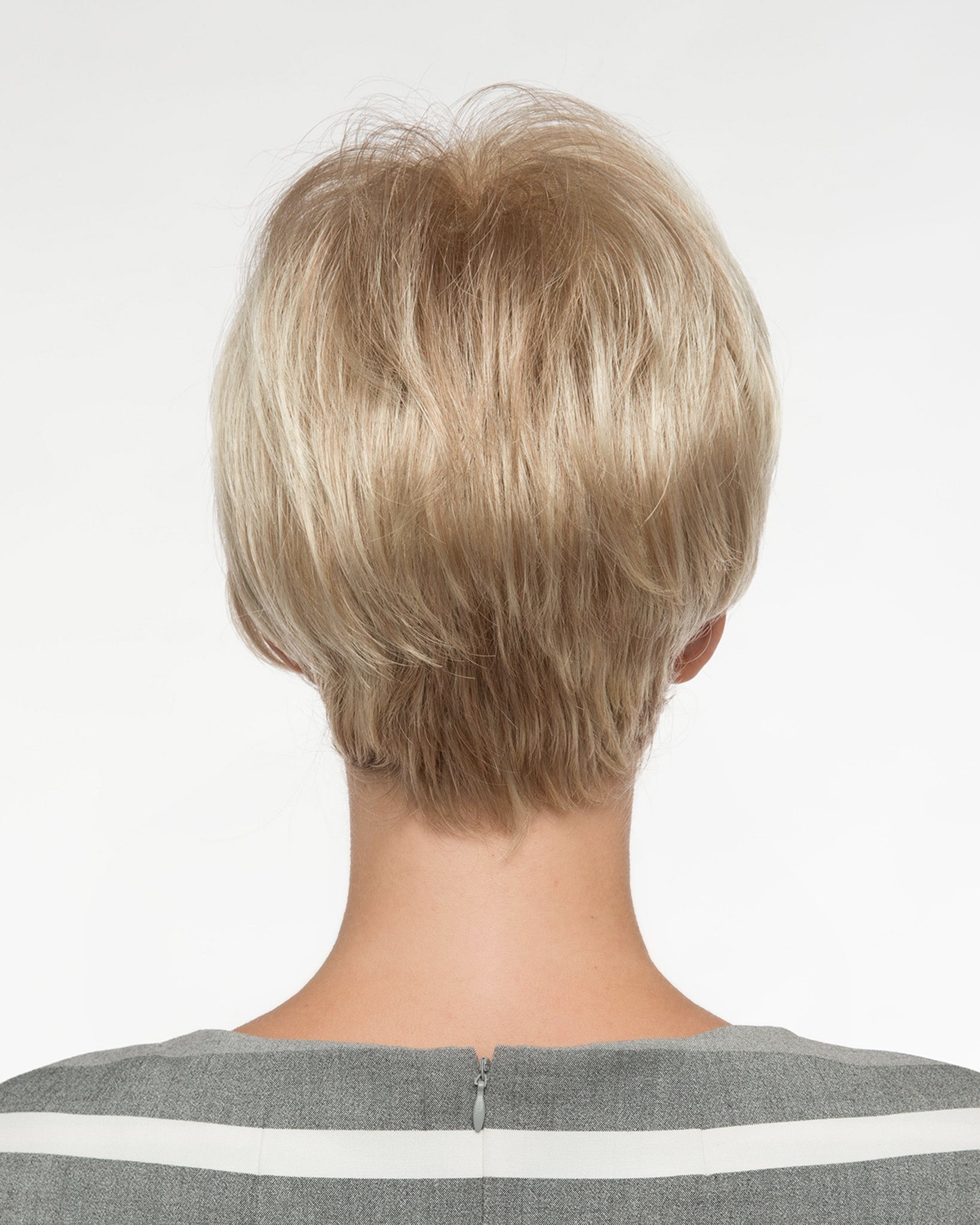 back side of a short Kinner Beauty Wigs wig on woman head