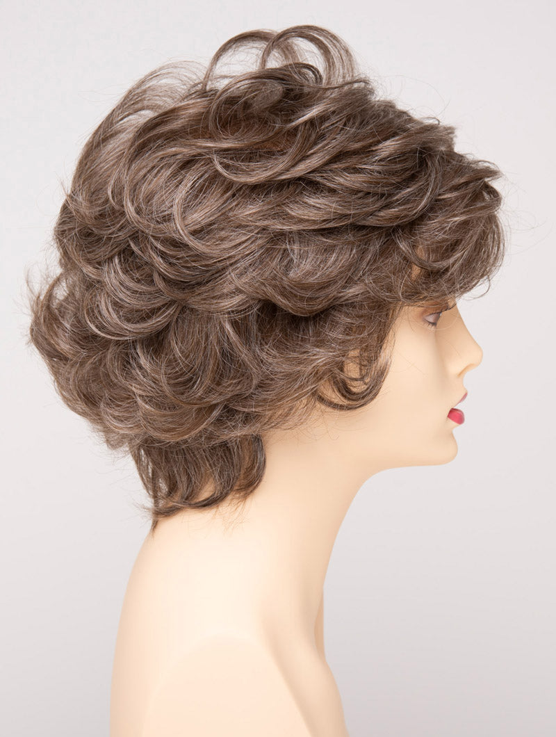 profile side of a short Kinner Beauty Wigs wig for woman on mannequin head
