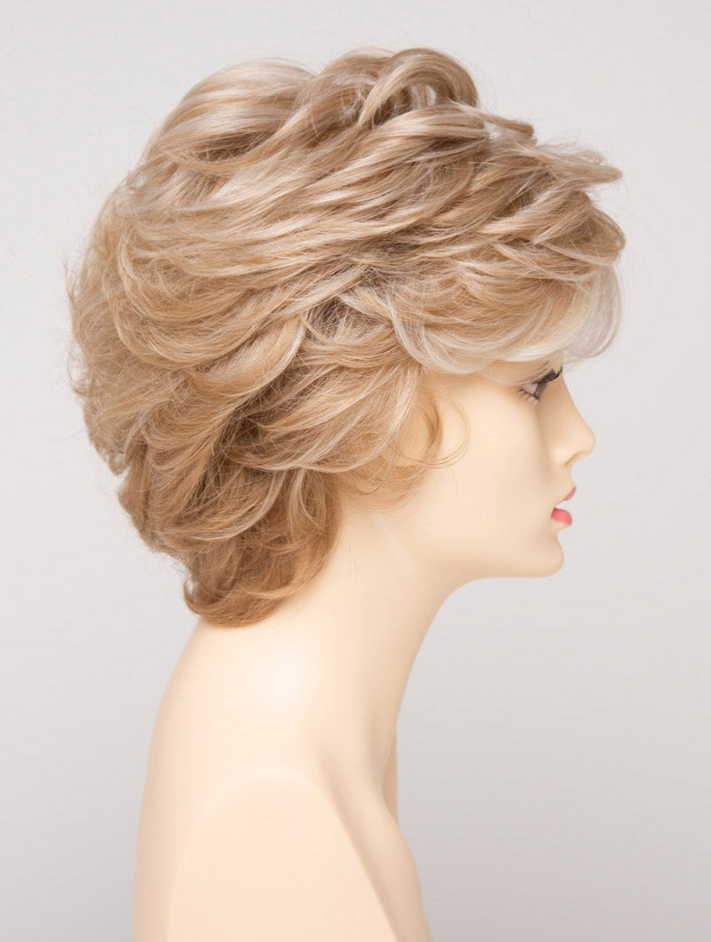 profile side of a short Kinner Beauty Wigs wig for woman on mannequin head