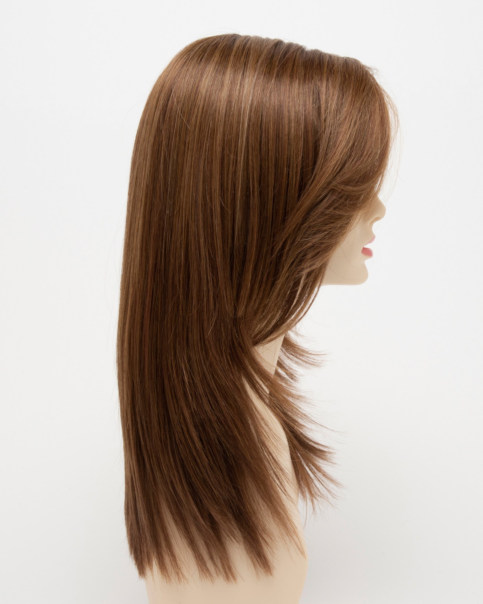profile side of a long Kinner Beauty Wigs wig for woman on mannequin head