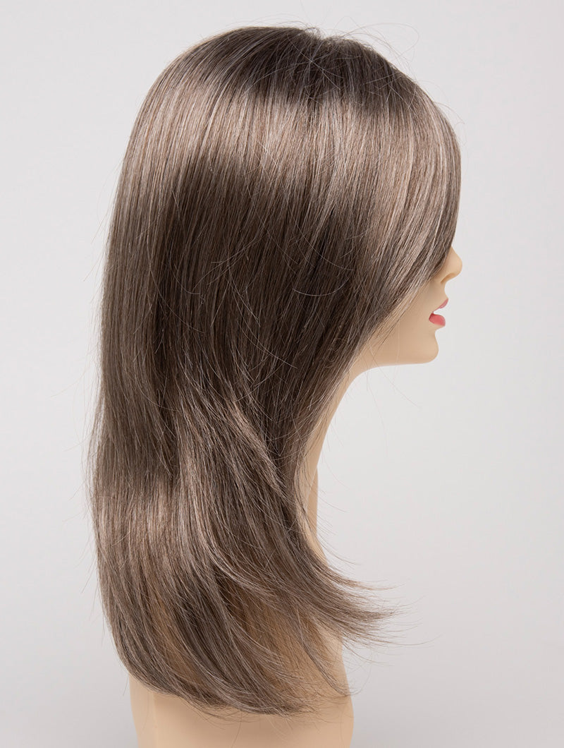 profile side of a long Kinner Beauty Wigs wig for woman on mannequin head