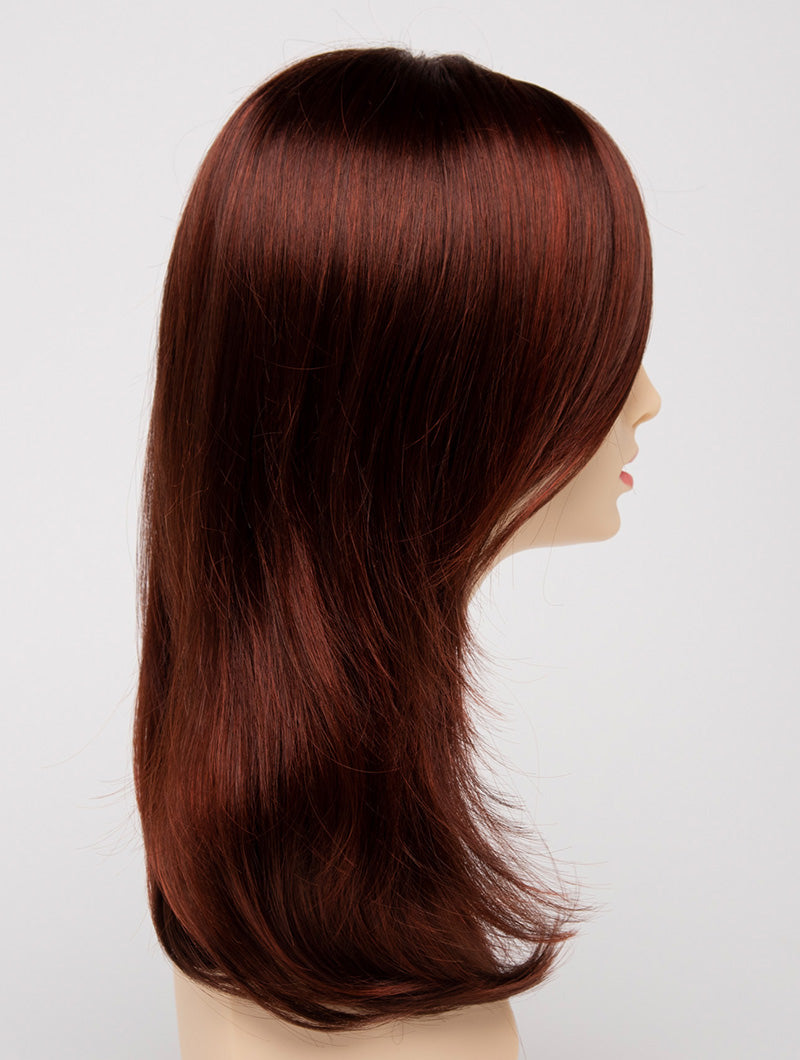 profile side of a long Kinner Beauty Wigs wig for woman on mannequin head