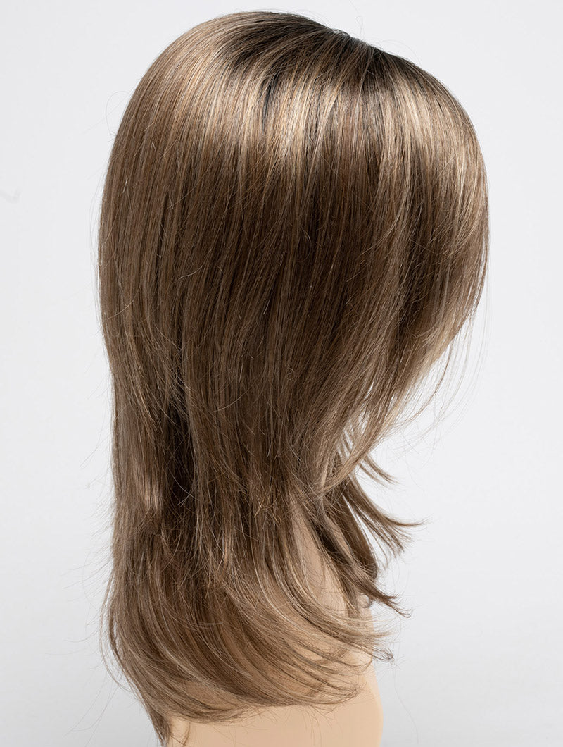 profile side of a long Kinner Beauty Wigs wig for woman on mannequin head
