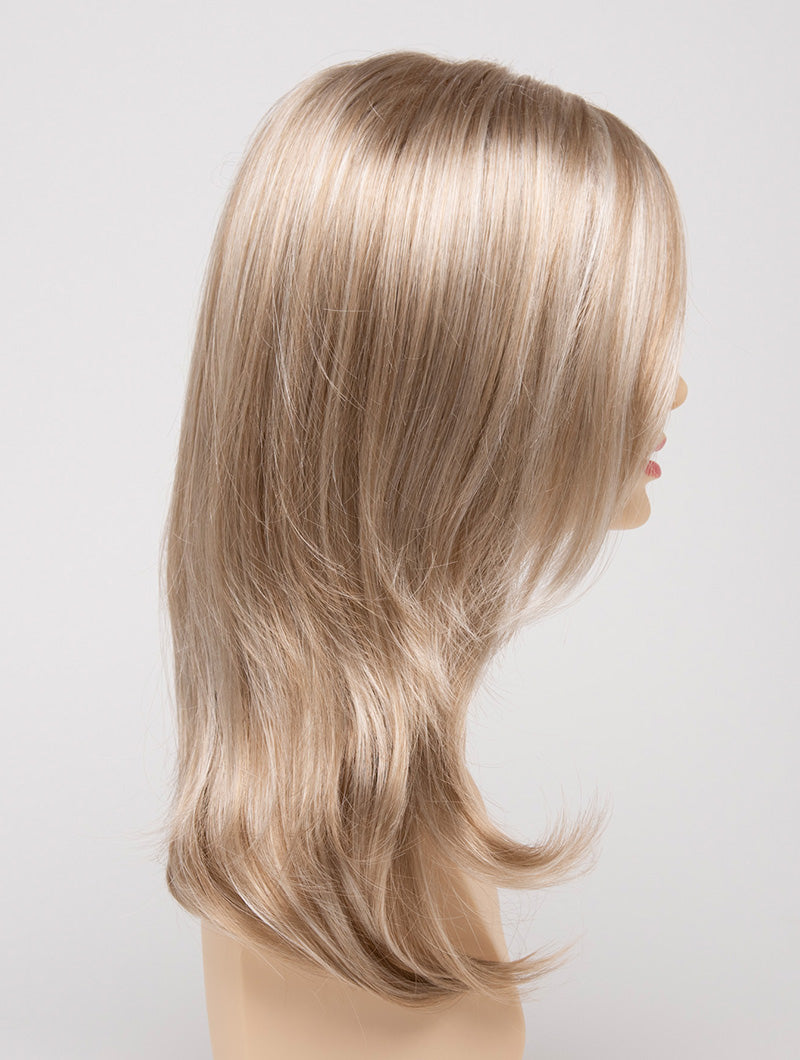profile side of a long Kinner Beauty Wigs wig for woman on mannequin head