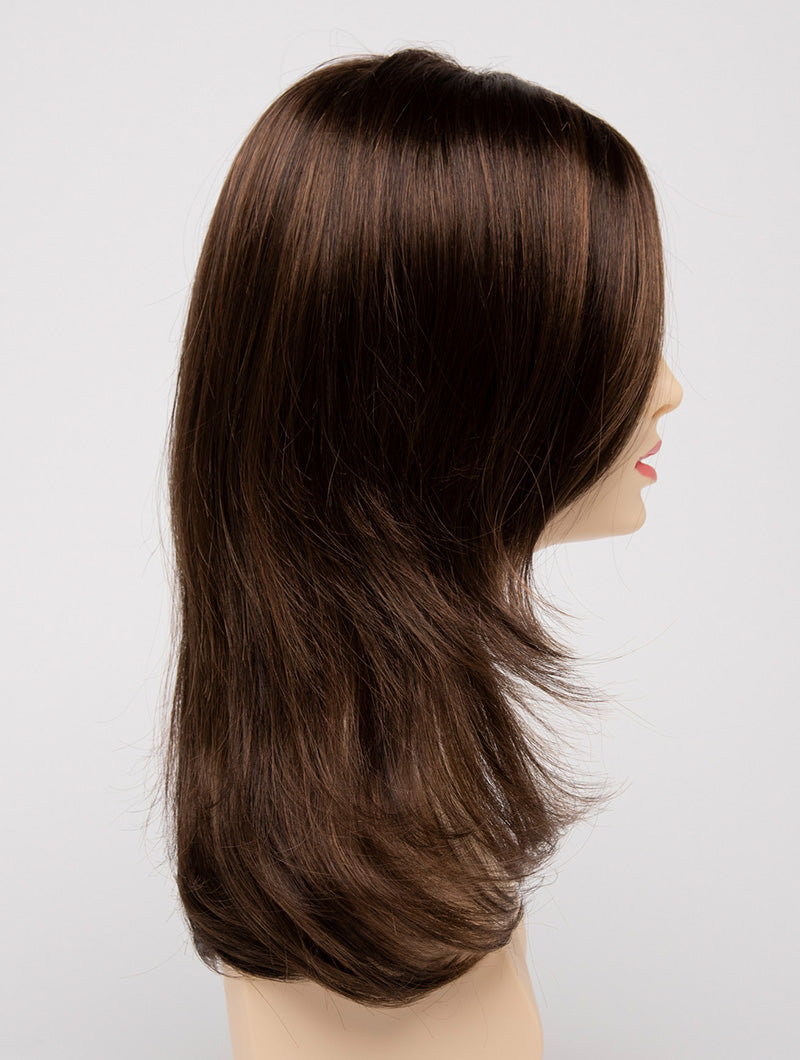 profile side of a long Kinner Beauty Wigs wig for woman on mannequin head