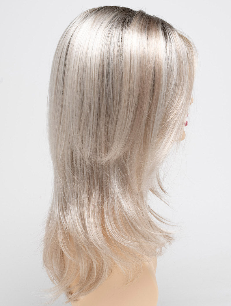 profile side of a long Kinner Beauty Wigs wig for woman on mannequin head