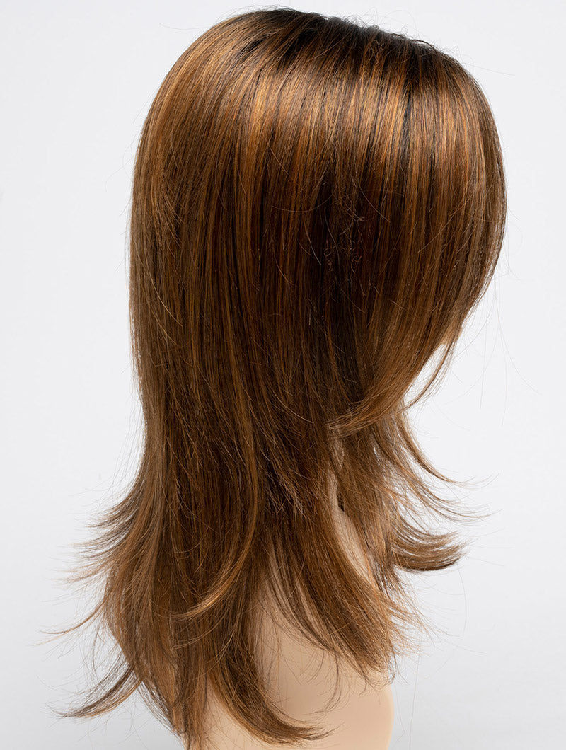 profile side of a long Kinner Beauty Wigs wig for woman on mannequin head