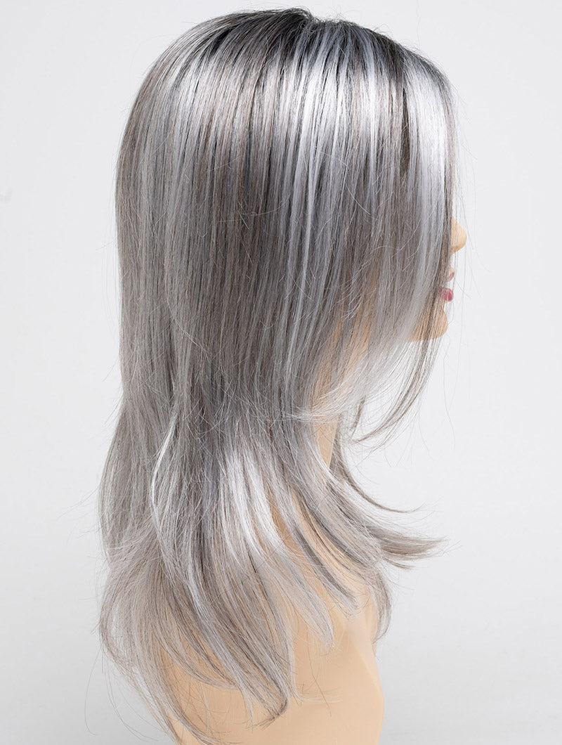 profile side of a long Kinner Beauty Wigs wig for woman on mannequin head
