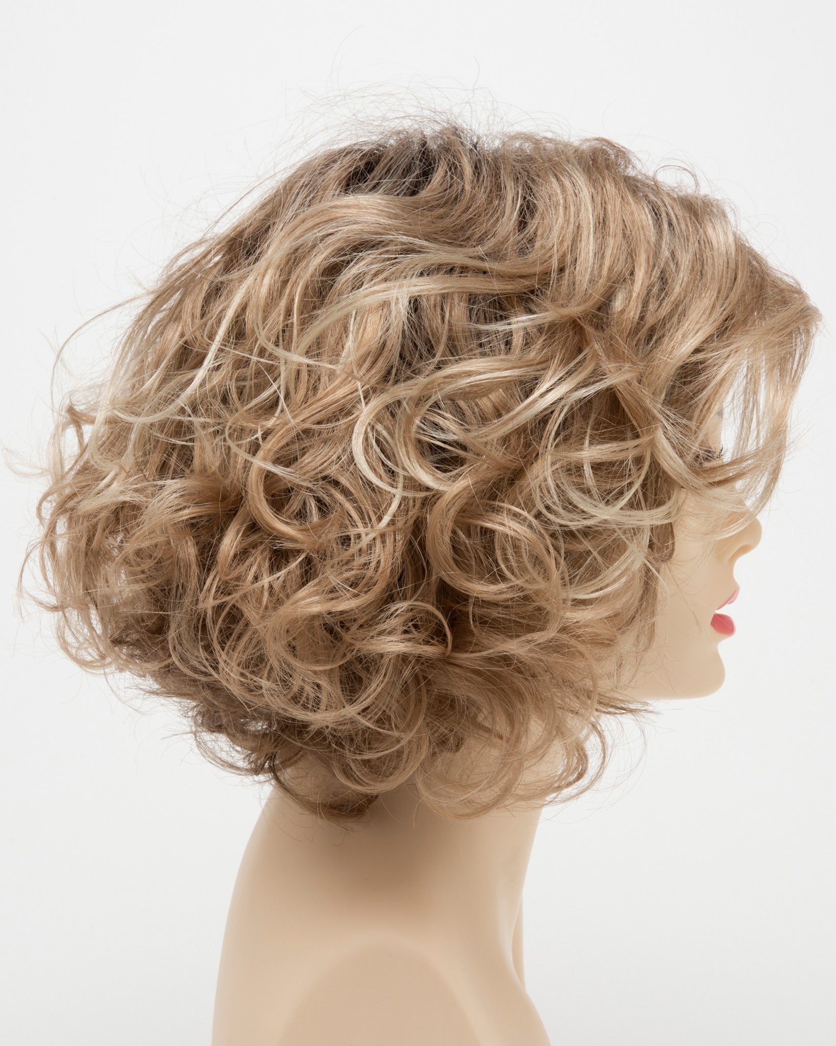 profile side of a medium Kinner Beauty Wigs wig for woman on mannequin head