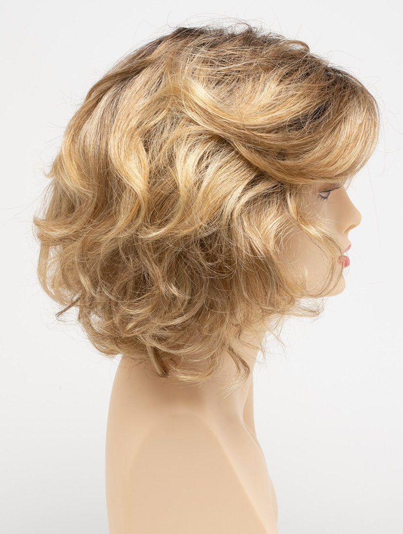 profile side of a medium Kinner Beauty Wigs wig for woman on mannequin head