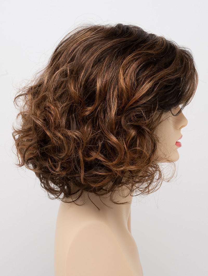 profile side of a medium Kinner Beauty Wigs wig for woman on mannequin head