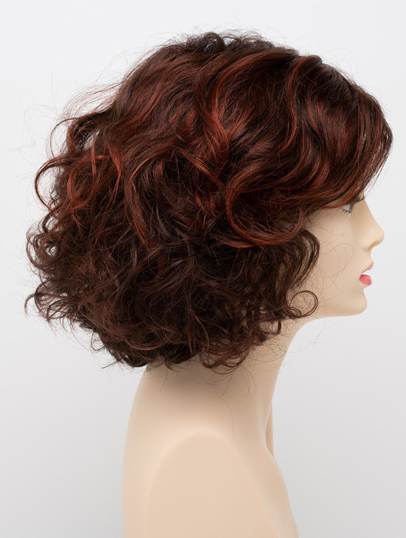 profile side of a medium Kinner Beauty Wigs wig for woman on mannequin head