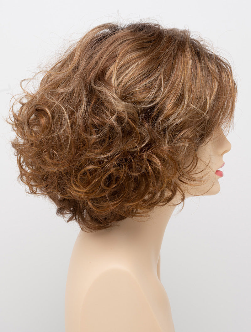 profile side of a medium Kinner Beauty Wigs wig for woman on mannequin head