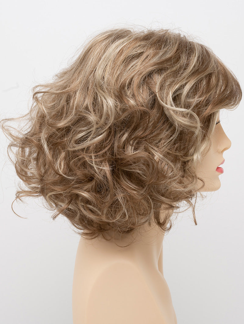 profile side of a medium Kinner Beauty Wigs wig for woman on mannequin head