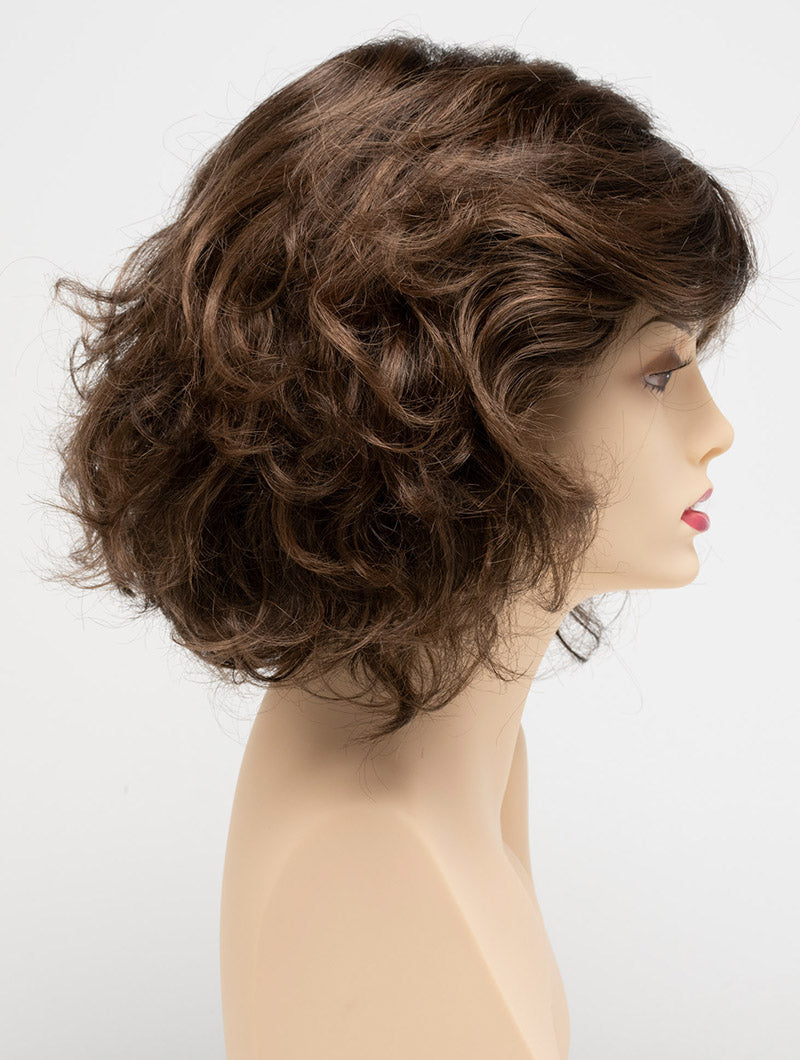 profile side of a medium Kinner Beauty Wigs wig for woman on mannequin head