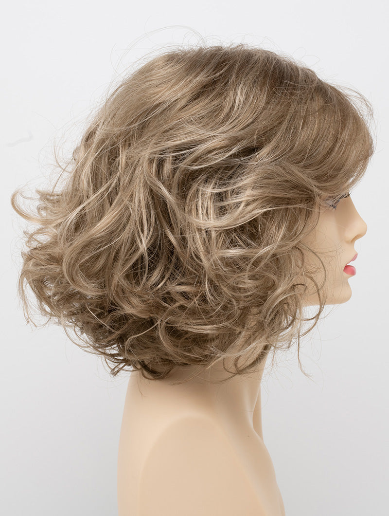 profile side of a medium Kinner Beauty Wigs wig for woman on mannequin head