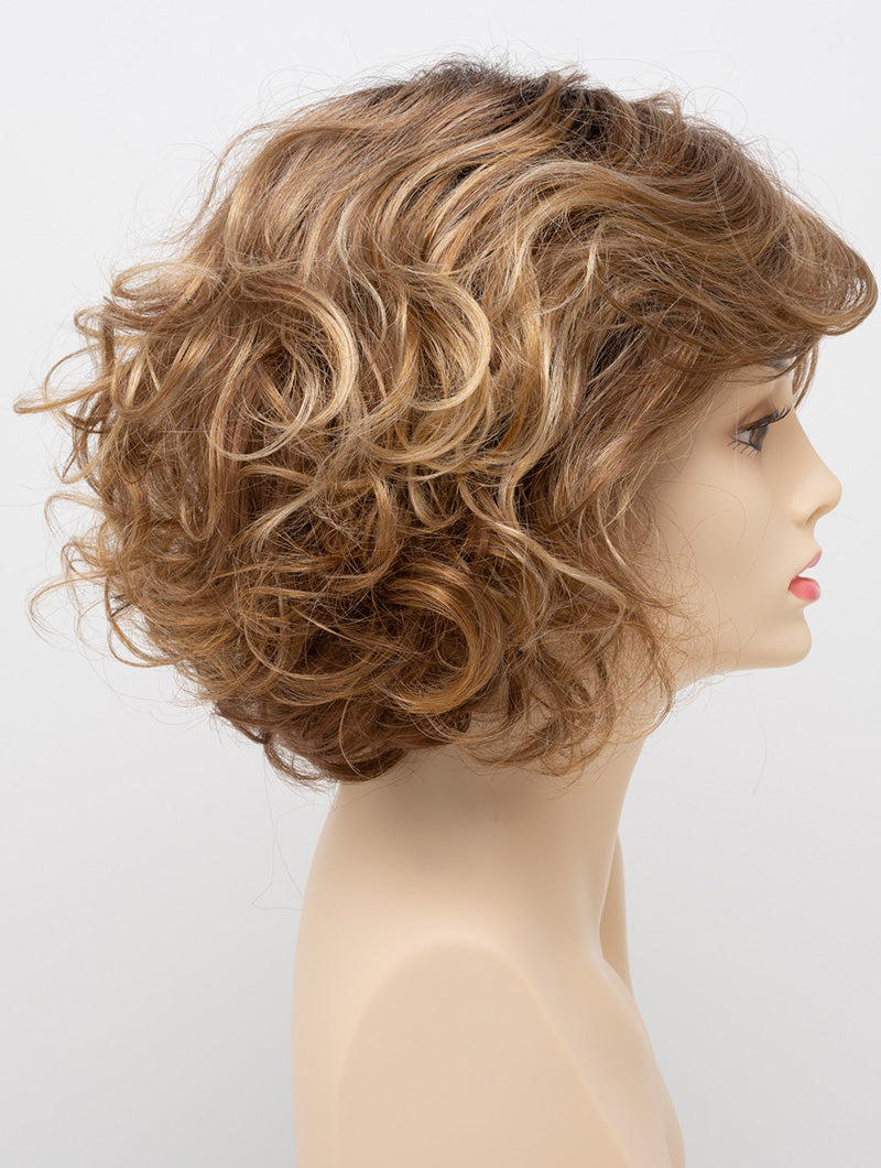 profile side of a medium Kinner Beauty Wigs wig for woman on mannequin head