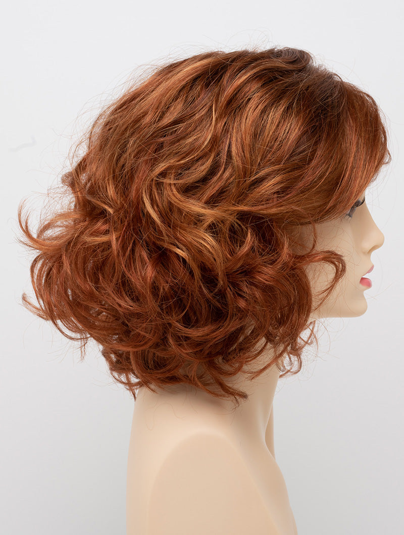 profile side of a medium Kinner Beauty Wigs wig for woman on mannequin head