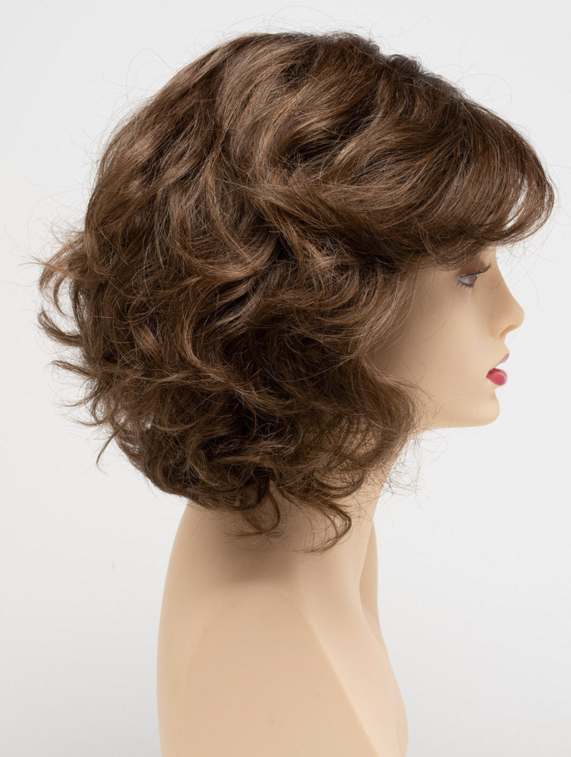 profile side of a medium Kinner Beauty Wigs wig for woman on mannequin head