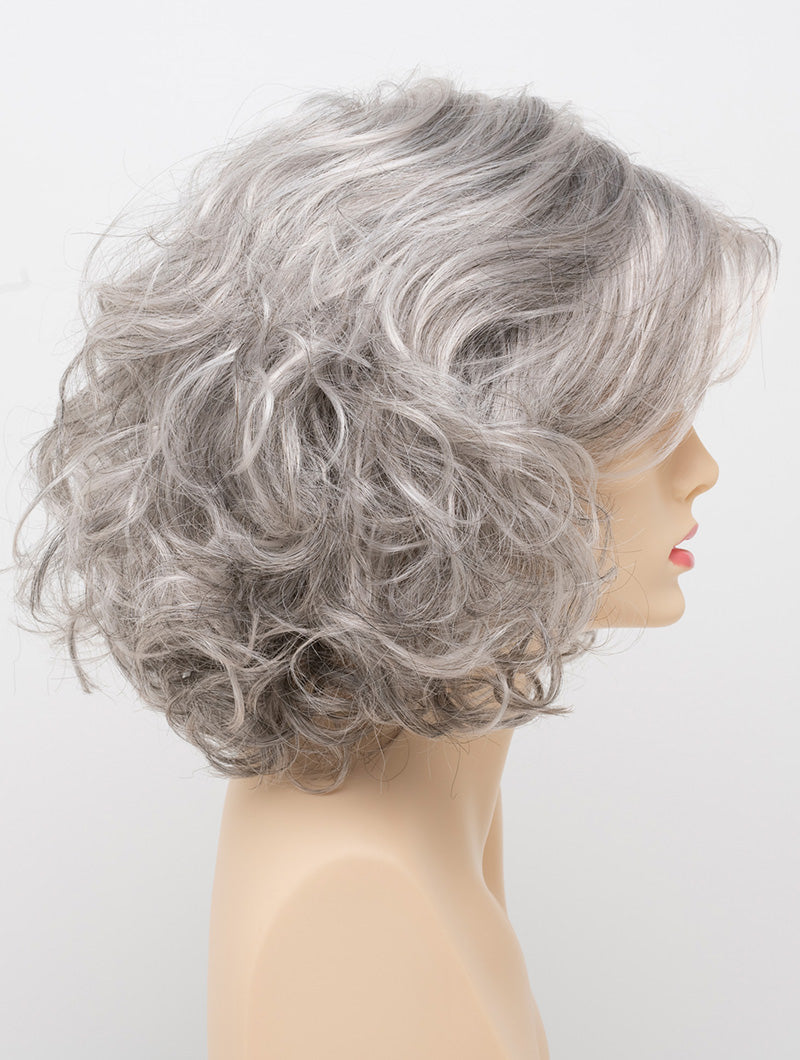 profile side of a medium Kinner Beauty Wigs wig for woman on mannequin head