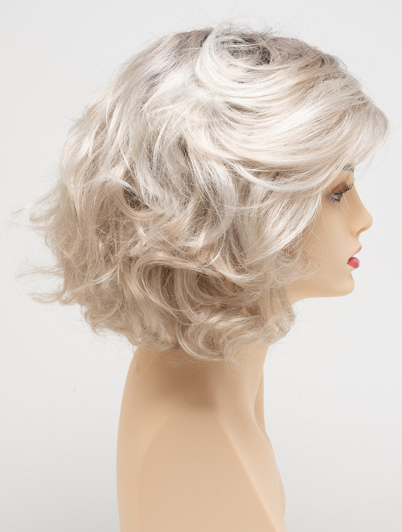 profile side of a medium Kinner Beauty Wigs wig for woman on mannequin head