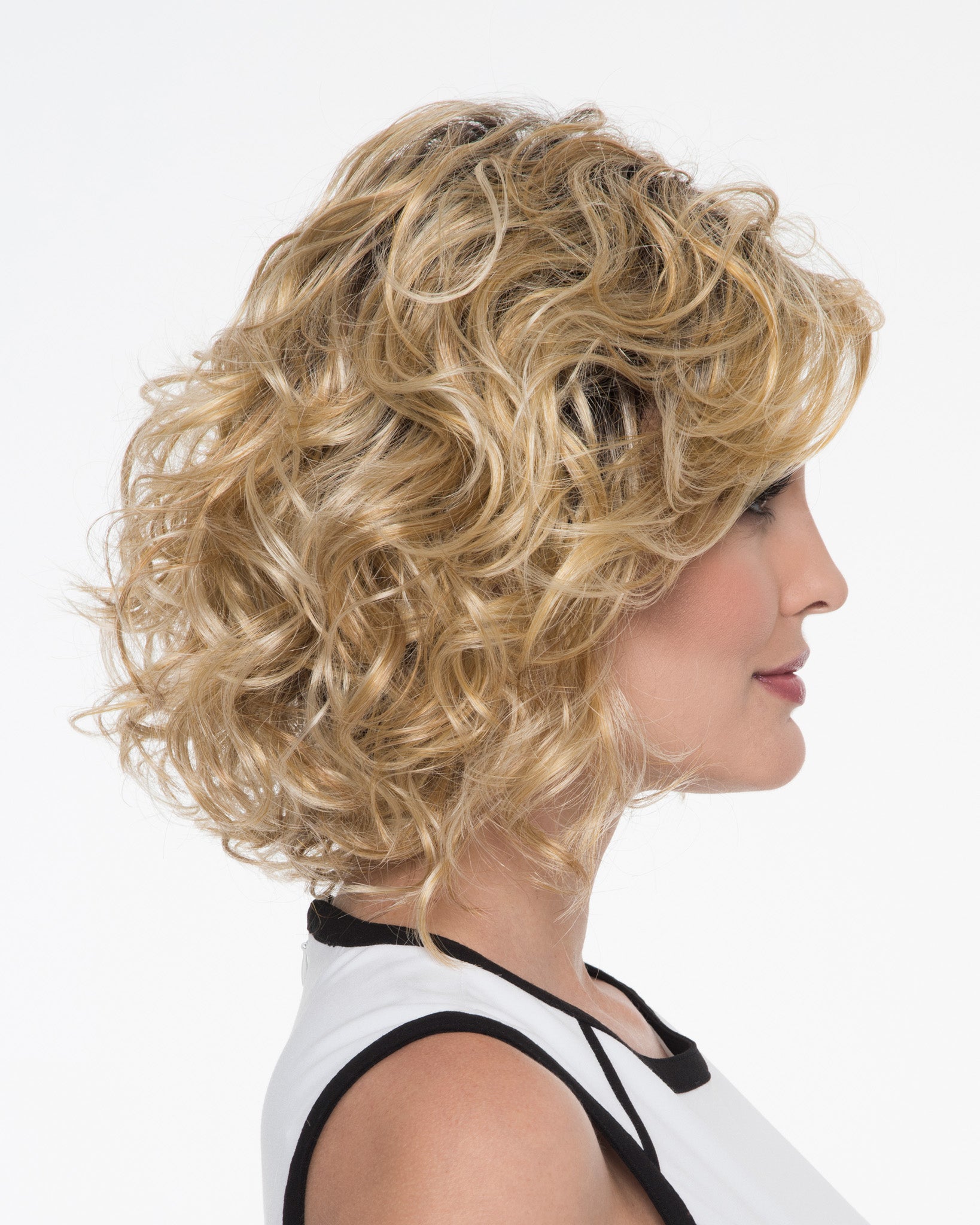 profile side of a medium Kinner Beauty Wigs wig on woman head