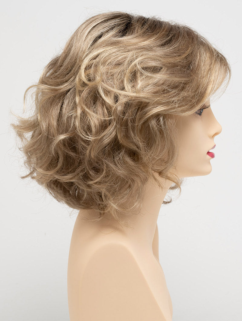 profile side of a medium Kinner Beauty Wigs wig for woman on mannequin head