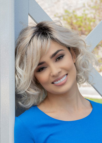 front side of a medium Kinner Beauty Wigs wig on woman head